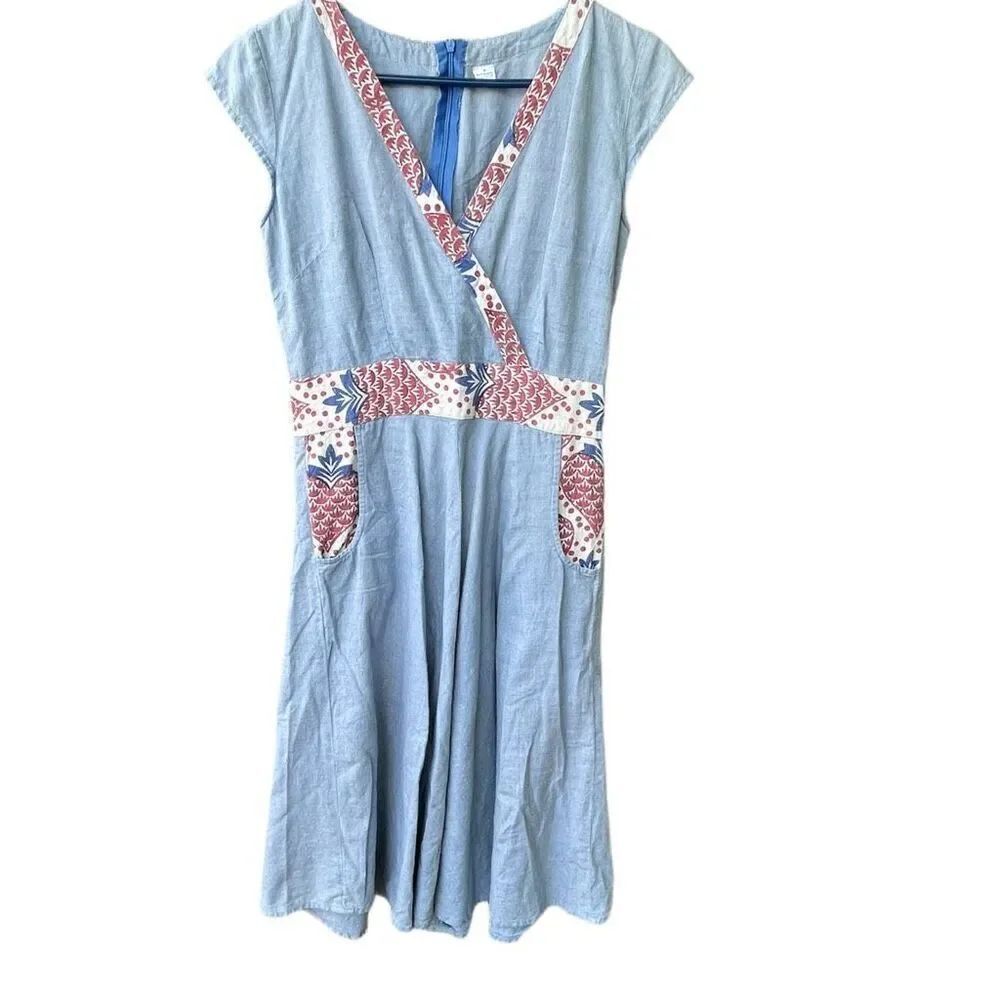Pinup style Chambray dress size M ( runs S) cap sleeves fit n flare faux wrap .